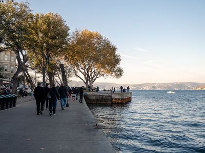 A person walking purposefully on a clear path.