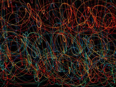 Abstract light trails suggesting vibrant energy.